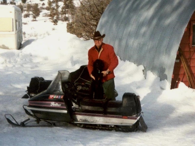 1982 George and his snow mobile at their home in Pagosa Springs